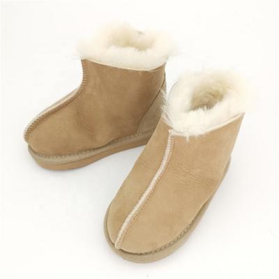 HQS-KS001 OEM customized premium quality winter thermal genuine sheepskin slippers for children.