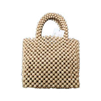 classic fashion hand-woven beach bag made with natural wood beads and vintage bamboo bag