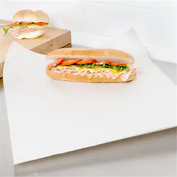 white baking paper coating side non-stick with food in the oven
