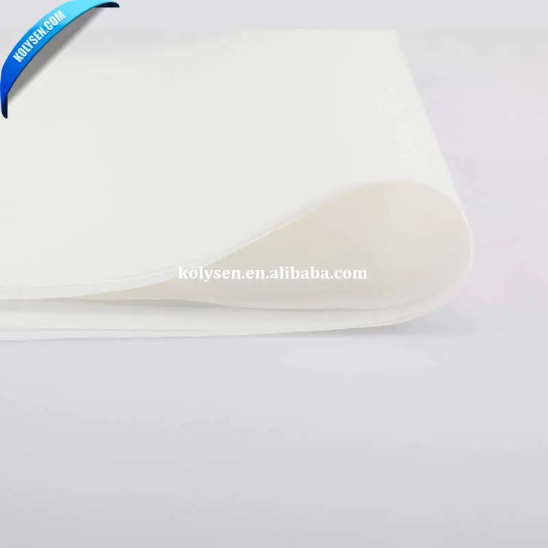 white baking paper coating side non-stick with food in the oven
