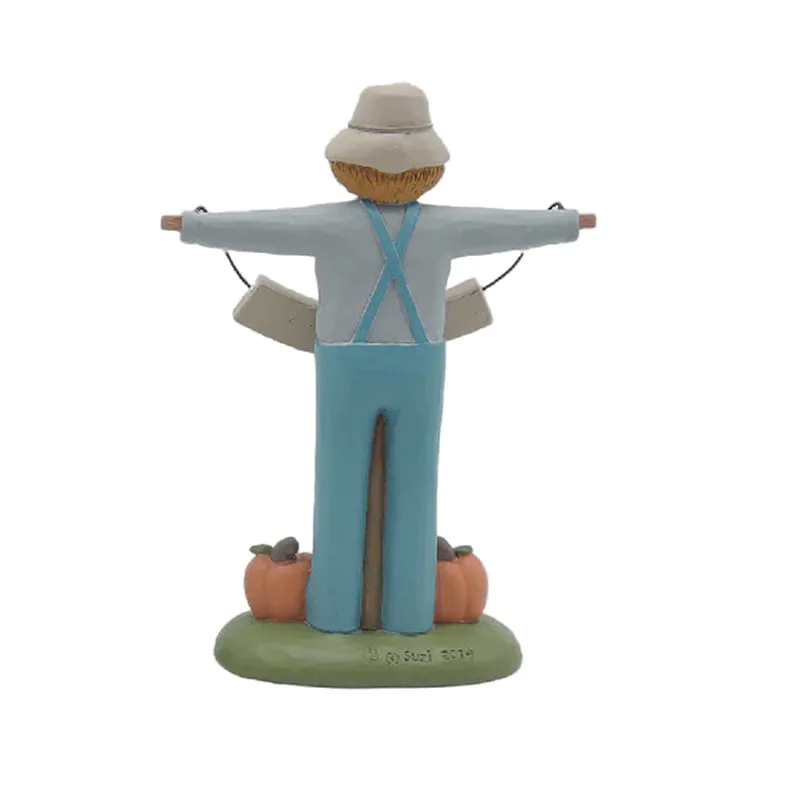 The Scarecrow Takes The Welcome Card And String On The Base Resin Scarecrow Figurines For Home Decor