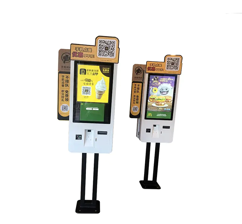 Standing kiosk with QR code reader in restaurantwith internet interface