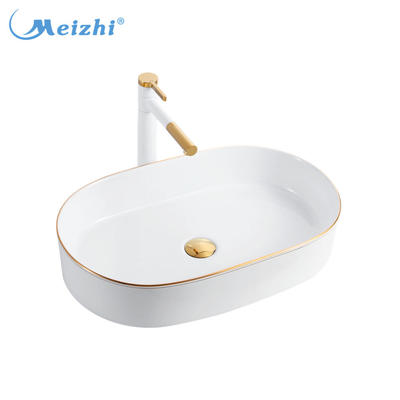 Bathroom ceramic gold art sink oval shaped wash basin for Saudi Arab