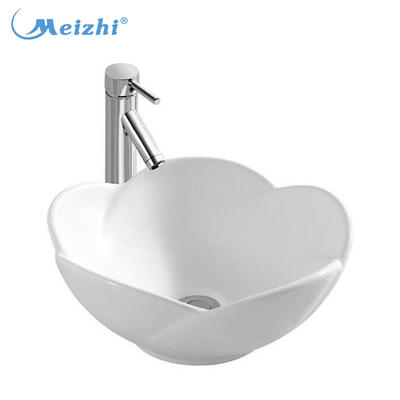 Ceramic flower shaped table top wash basin