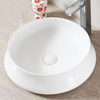 Ceramic round wash basin designs in living room