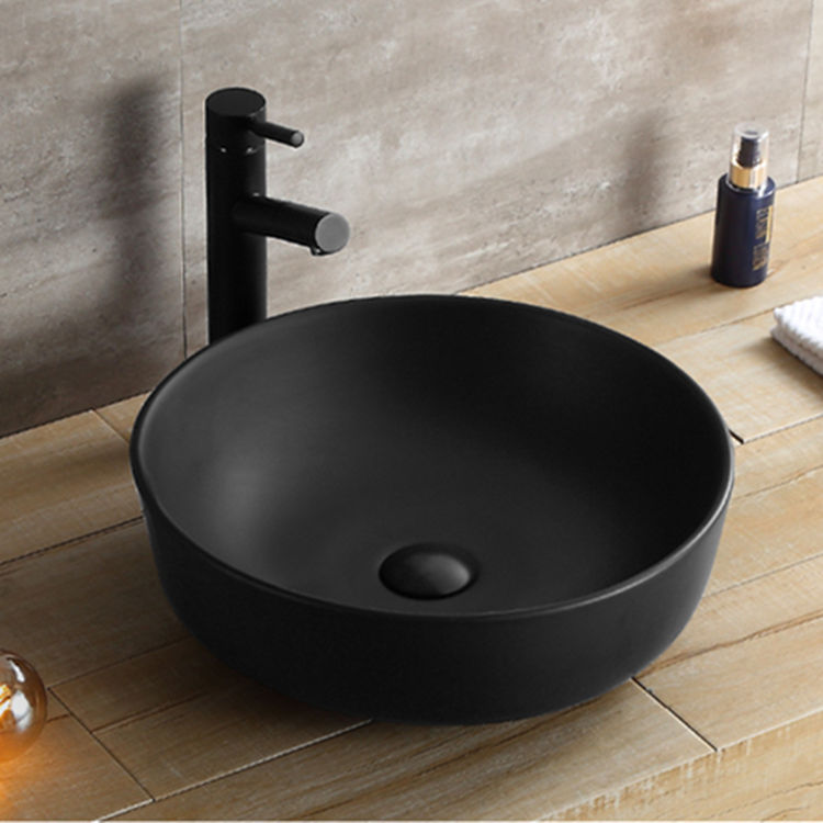 Black color wash basin counter designs