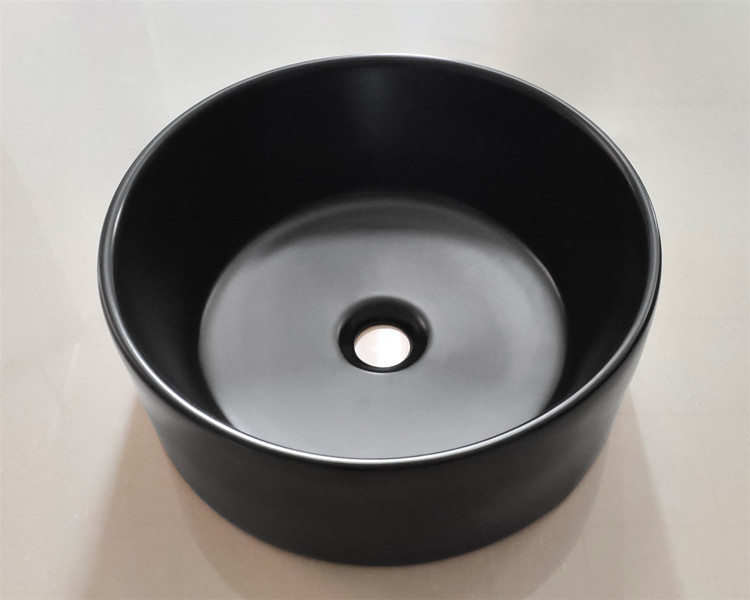 Cheap price bathroom counter black ceramic wash sink