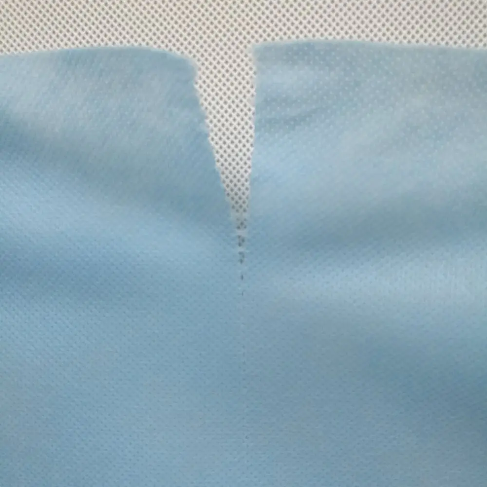 Sanitary Napkin PP Spunbond Perforated Nonwoven Fabric Raw Material