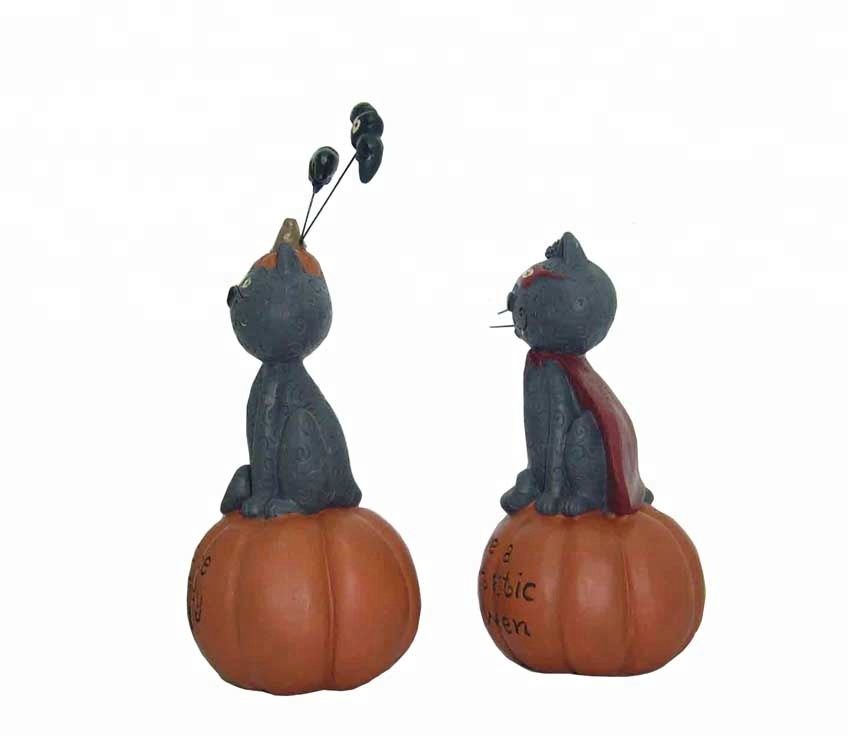 The cat man standing on a pumpkin for Hallowmas garden decorative resin statues