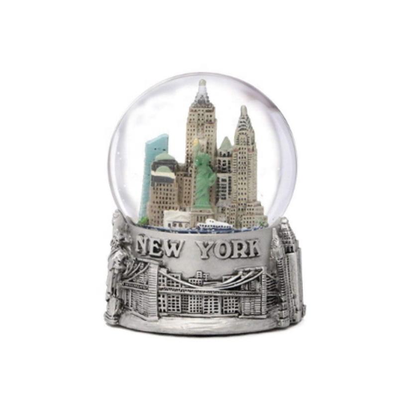 Amazon hot sale resin Christmas snow globe with building inside