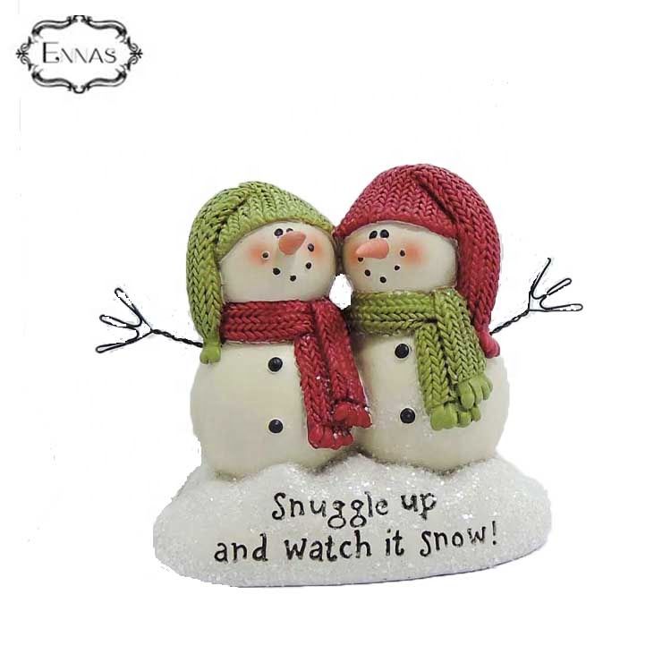 The polyresin Christmasgiftwhich snuggle up watch snow' snowmen on base(m2)