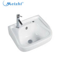 Twyford wall hung bathroom sinks with two faucets