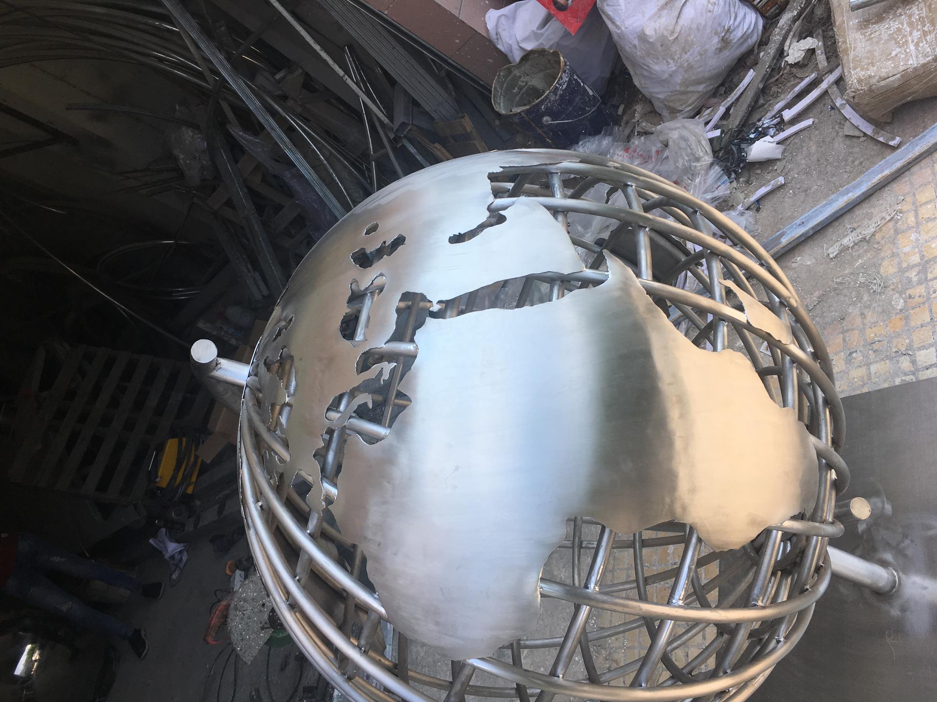 world map sphere/sculpture