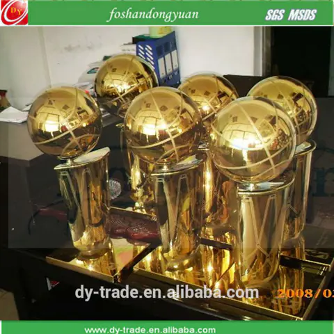 gold plated metal football trophy