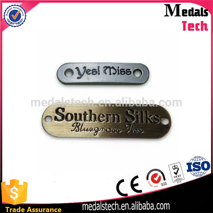 Hot Sell custom embossed alloy material antique metal brand logo label sew