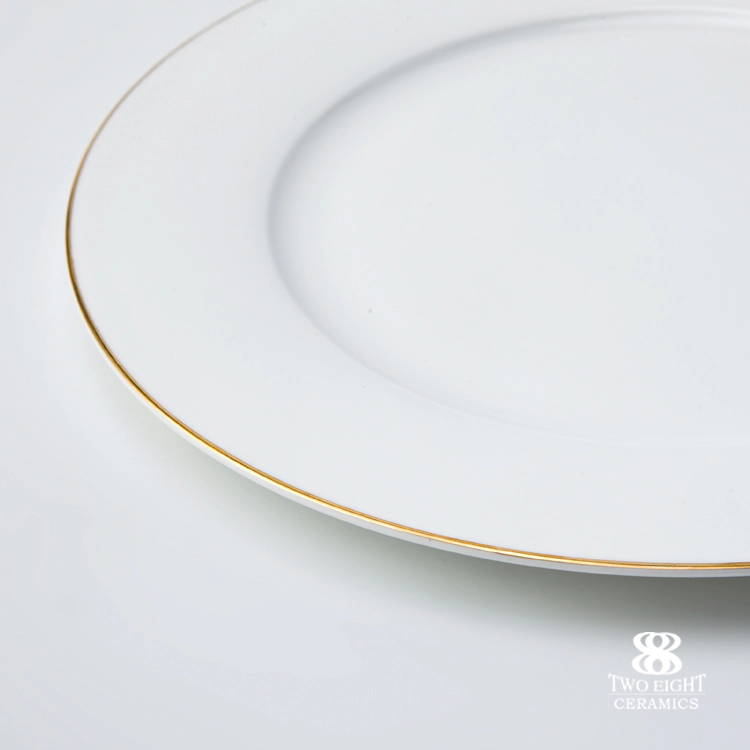 High new bone china dinner set with gole charger plate unique luxury golen rim ceramic diner ware gold cutlery set for banquet