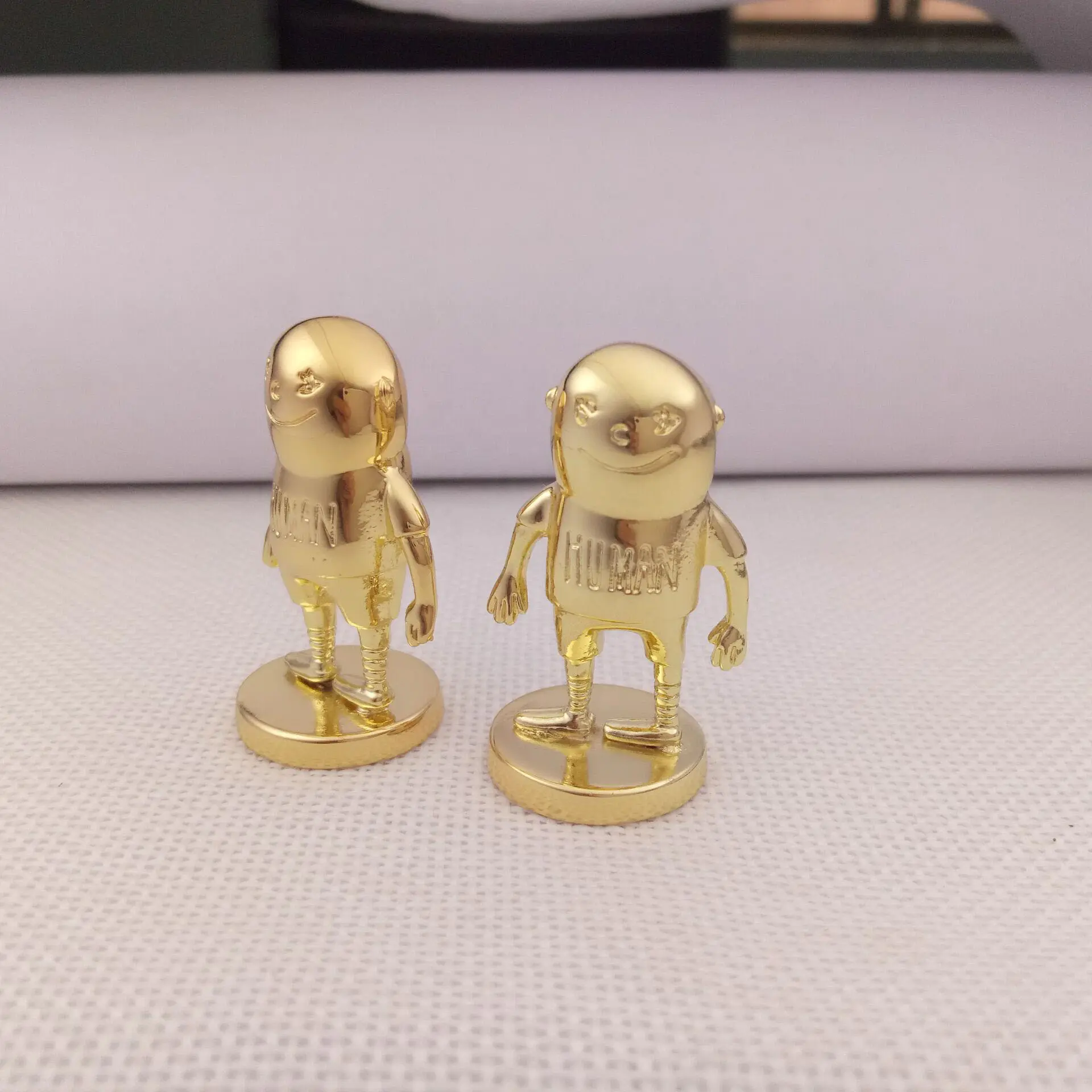 Fan made custom home office interior decoration golden metal japanese movie statue for desk