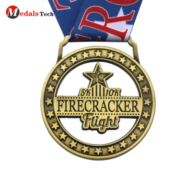 Cheap custom hollow out round antique firecracker flight 5k 10k embossed logo soft enamel finisher medal gold