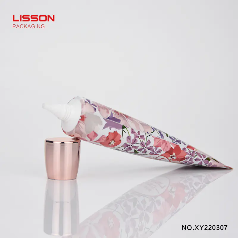 collapsible cosmetic packaging tube with long nozzle applicator