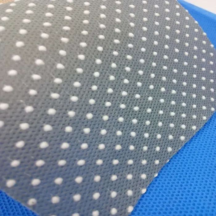 PP Spunbond Nonwoven Fabric Anti-Slip with PVC DOT TNT for Slippers/Hotel Slippers Anti-Skid