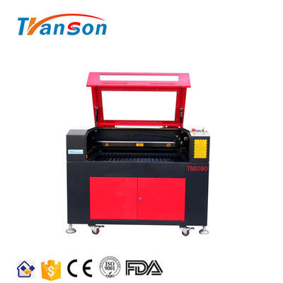 New Arrival High Efficiency CO2 Laser Engraving And Cutting Machine fabric And Cloth For Sale