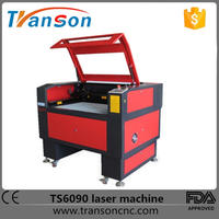 Alibaba hot sale! jewelry / cake topper / die board / plywood / wood small CO2 laser cutting machine