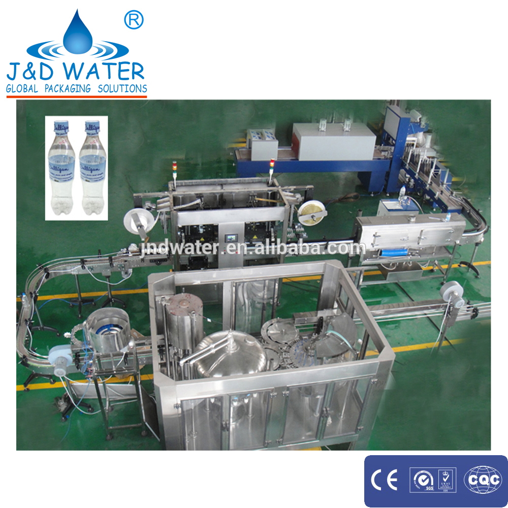 Complete drinking water bottling plant with double head labeling machine