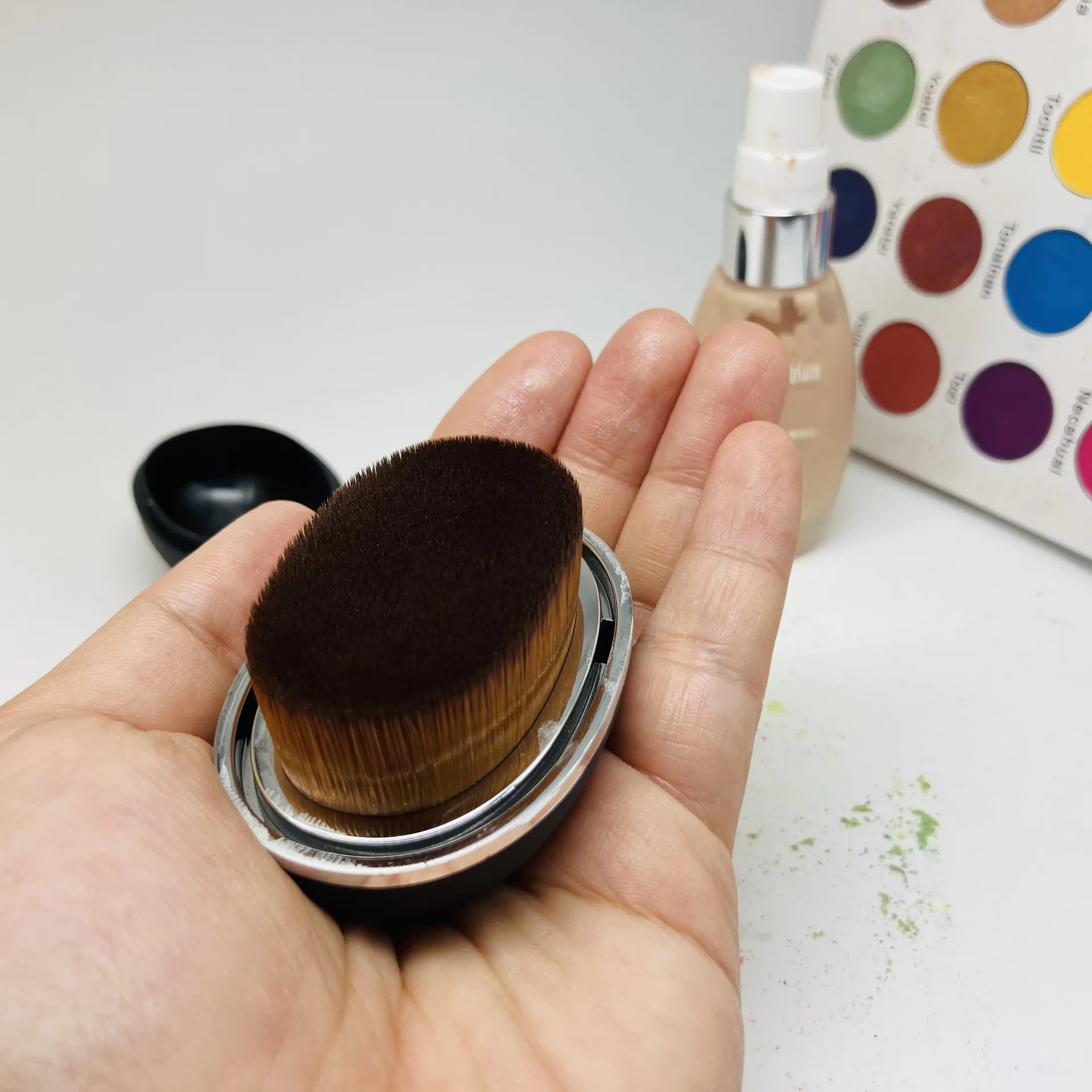Nouvelle boîte magique en plastique ovale fabrication de pinceaux de maquillage de fond de teint en poudre cosmétique mignon