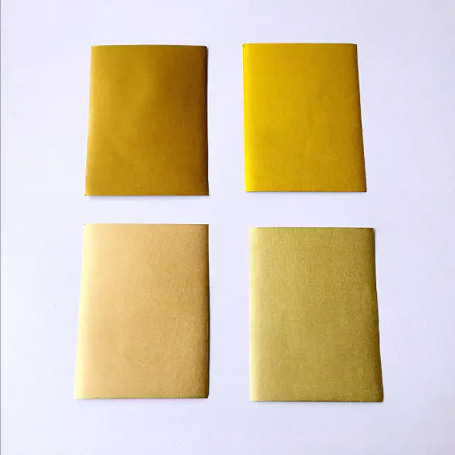 Individual chocolate gold aluminum foil wrapped paper