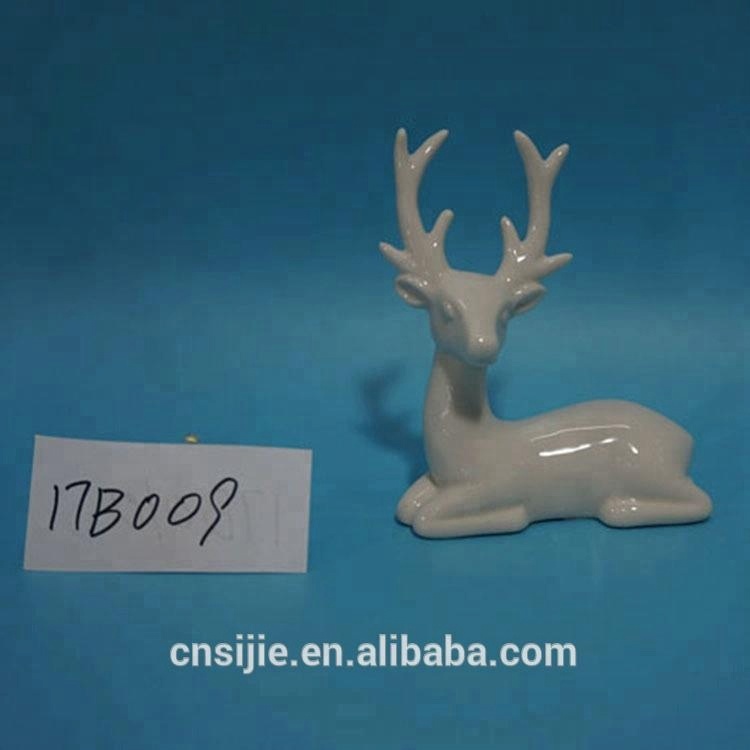Ceramic white deer kneeing shape porcelain Christmas reindeer figurines for kids