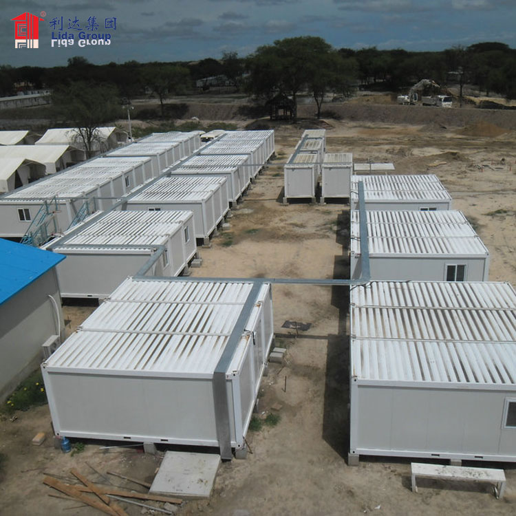 Casa de campo hecha de casa de contenedores de paquete plano de 20 pies en Sudáfrica Proveedor de alta calidad en China