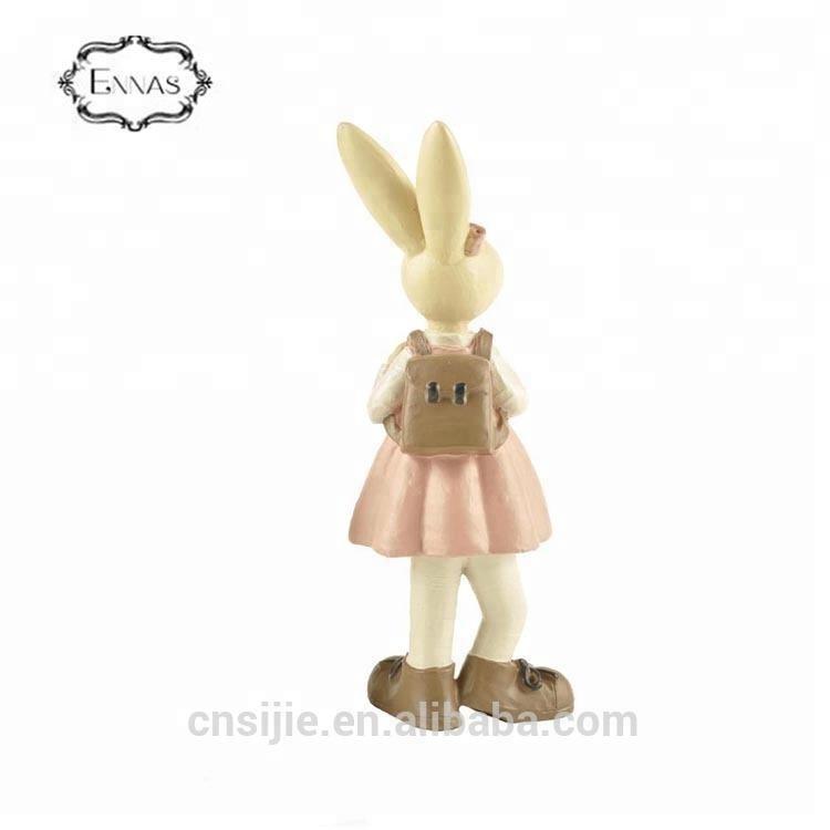 Hot selling resin figurines girl rabbit with backbag