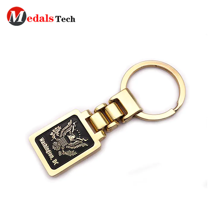 Custom embossed logo shinny gold finish tourist souvenir keychain