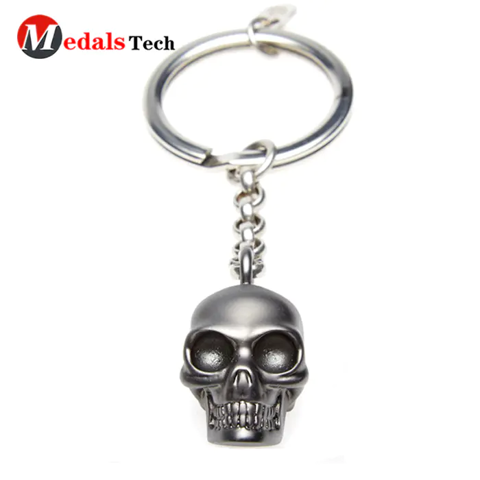 Promotional unique lovely custom skulls head metal keychain