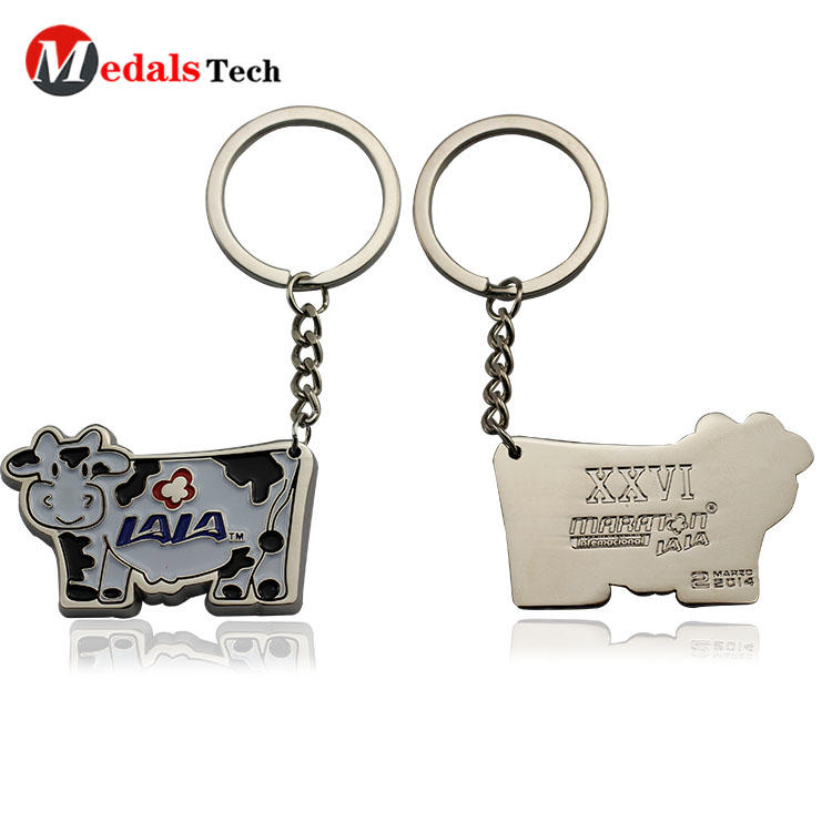 Wholesale cute cow shaped engraved logo souvenir metal keychain