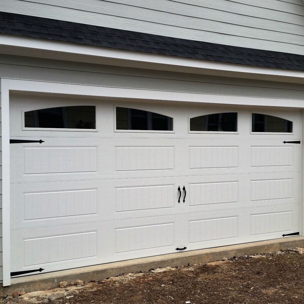 Single white horizontal slatted aluminium sectional garage door
