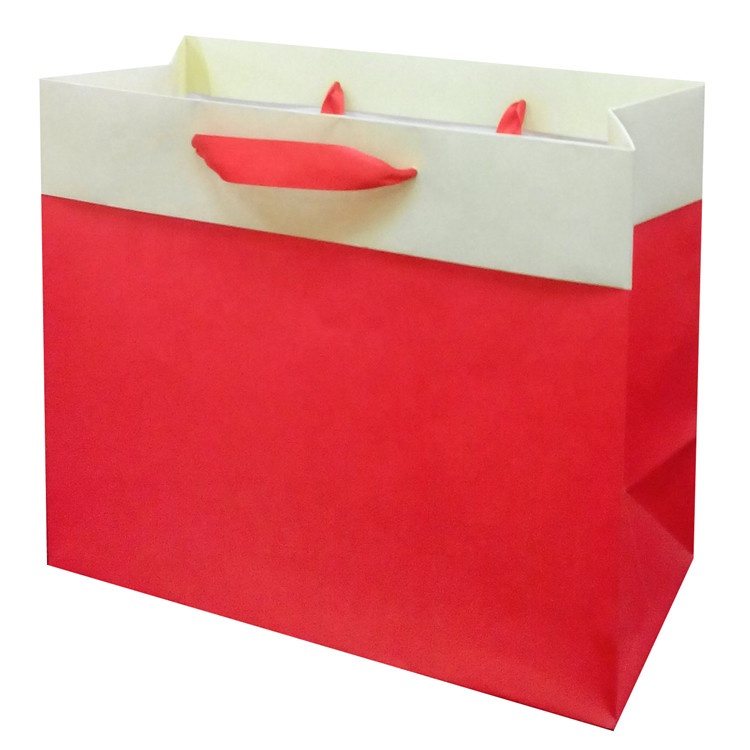 Venta al por mayor Tamaño estándar personalizado Plegable Eco-Friendly Fashion Bolsas de papel de color sólido con asas de cuerda